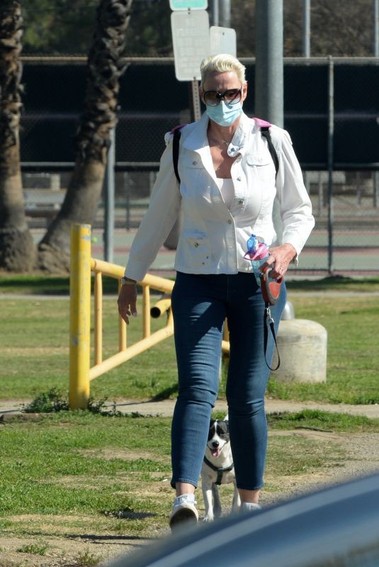 BRIGITTE NIELSEN Out with her Dog at a Park in Los Angeles 02/07/2021