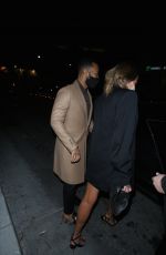 CHRISSY TEIGEN and John Legend at Sapgos Restaurant in Los Angeles 02/01/2021