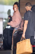 CHRISSY TEIGEN in a Denim Shorts Out in Los Angeles 02/11//2021