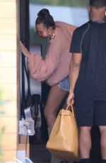 CHRISSY TEIGEN in a Denim Shorts Out in Los Angeles 02/11//2021