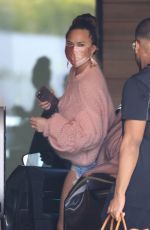 CHRISSY TEIGEN in a Denim Shorts Out in Los Angeles 02/11//2021
