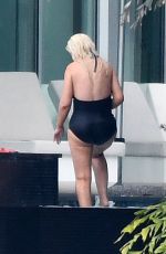 CHRISTINA AGUILRA in Swimsuit at a Pool in Miami 02/12/2021
