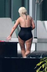 CHRISTINA AGUILRA in Swimsuit at a Pool in Miami 02/12/2021