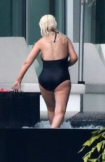 CHRISTINA AGUILRA in Swimsuit at a Pool in Miami 02/12/2021