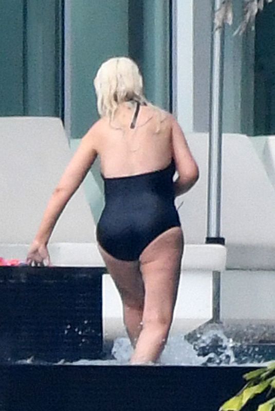 CHRISTINA AGUILRA in Swimsuit at a Pool in Miami 02/12/2021