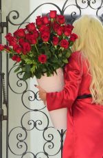 ERIKA JAYNE Receiving Flowers Outside Her Home in Los Angeles 02/13/2021
