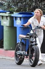 FLORENCE PUGH Out Riding a Electric Bike in Los Angeles 02/20/2021