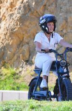 FLORENCE PUGH Out Riding a Electric Bike in Los Angeles 02/20/2021