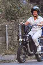 FLORENCE PUGH Out Riding a Electric Bike in Los Angeles 02/20/2021