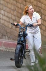 FLORENCE PUGH Out Riding a Electric Bike in Los Angeles 02/20/2021