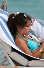 HANNAH ANN SLUSS Relaxes on the Beach in Miami 02/17/2021