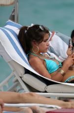 HANNAH ANN SLUSS Relaxes on the Beach in Miami 02/17/2021