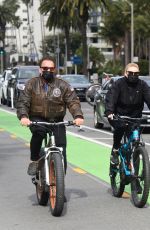 HEATHER MILLIGAN and Arnold Schwarzenegger Out Riding Bikes in Santa Monica 02/13/2021