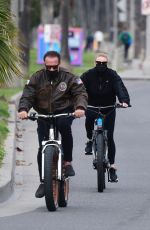HEATHER MILLIGAN and Arnold Schwarzenegger Out Riding Bikes in Santa Monica 02/13/2021