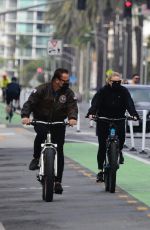 HEATHER MILLIGAN and Arnold Schwarzenegger Out Riding Bikes in Santa Monica 02/13/2021