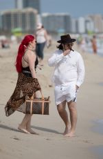 HUNTER in Swimsuit and Denny Strickland on the Beach in Miami 02/02/201