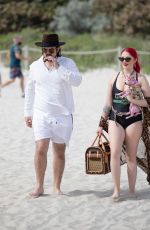 HUNTER in Swimsuit and Denny Strickland on the Beach in Miami 02/02/201