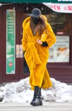 IRINA SHAYK in a Long Yellow Coat Out in New York 02/12/2021