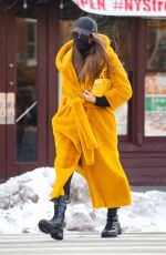 IRINA SHAYK in a Long Yellow Coat Out in New York 02/12/2021