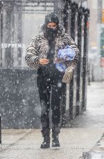 IRINA SHAYK in a Zebra Puffer Jacket on a Snowy Day in New York 02/22/2021