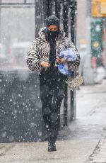 IRINA SHAYK in a Zebra Puffer Jacket on a Snowy Day in New York 02/22/2021