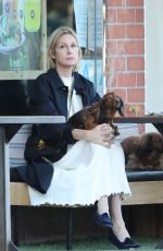 KELLY RUTHERFORD Out with her Dogs at Kreation Organic in Beverly Hills 02/18/2021