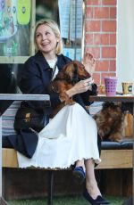 KELLY RUTHERFORD Out with her Dogs at Kreation Organic in Beverly Hills 02/18/2021