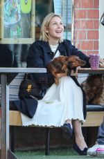 KELLY RUTHERFORD Out with her Dogs at Kreation Organic in Beverly Hills 02/18/2021