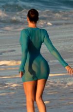 KHLOE KARDASHIAN at a Photoshoot on the Beach in Turks and Caicos 01/28/2021