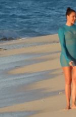 KHLOE KARDASHIAN at a Photoshoot on the Beach in Turks and Caicos 01/28/2021