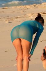 KHLOE KARDASHIAN at a Photoshoot on the Beach in Turks and Caicos 01/28/2021