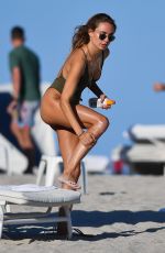 KIMBERLEY GARNER in Swimsuit at a Beach in Miami 02/05/2021