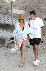 LAETICIA HALLYDAY and Jalil Lespert Out at a Beach in St. Barths 02/18/2021