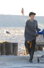 LONI WILLISON Pulls a Cart Out at Santa Monica Beach 02/20/201