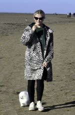 LUCY FALON Out with Her Dog on Blackpool Beach 02/22/2021