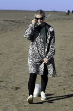 LUCY FALON Out with Her Dog on Blackpool Beach 02/22/2021