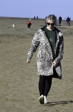 LUCY FALON Out with Her Dog on Blackpool Beach 02/22/2021