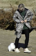 LUCY FALON Out with Her Dog on Blackpool Beach 02/22/2021