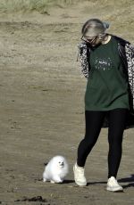 LUCY FALON Out with Her Dog on Blackpool Beach 02/22/2021