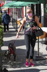 MILEY CYRUIS Out with her Dog in Beverly Hills 02/22/2021