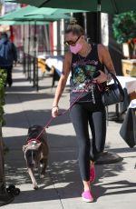 MILEY CYRUIS Out with her Dog in Beverly Hills 02/22/2021