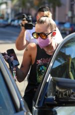MILEY CYRUIS Out with her Dog in Beverly Hills 02/22/2021