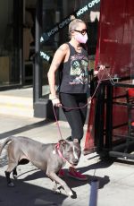 MILEY CYRUIS Out with her Dog in Beverly Hills 02/22/2021