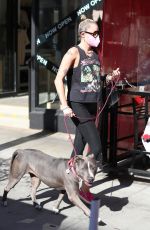 MILEY CYRUIS Out with her Dog in Beverly Hills 02/22/2021