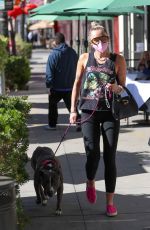 MILEY CYRUIS Out with her Dog in Beverly Hills 02/22/2021