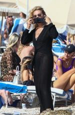 MONTANA TUCKER in Bikini at a Beach in Miami 02/12/2021