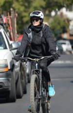 ROBIN WRIGHT and Clement Giraudet Out Riding Bikes in Los Angeles 02/11/2021