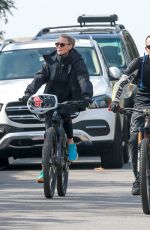 ROBIN WRIGHT and Clement Giraudet Out Riding Bikes in Los Angeles 02/11/2021