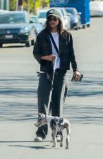 SASHA CALLE Out with Her Dog in Los Angeles 02/27/2021