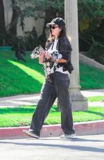 SASHA CALLE Out with Her Dog in Los Angeles 02/27/2021